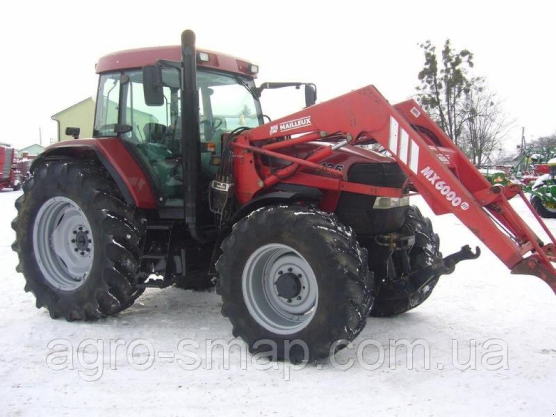 Oldtimer-Traktor tipa Case IH 135 MX, Neumaschine u Горохів (Slika 1)